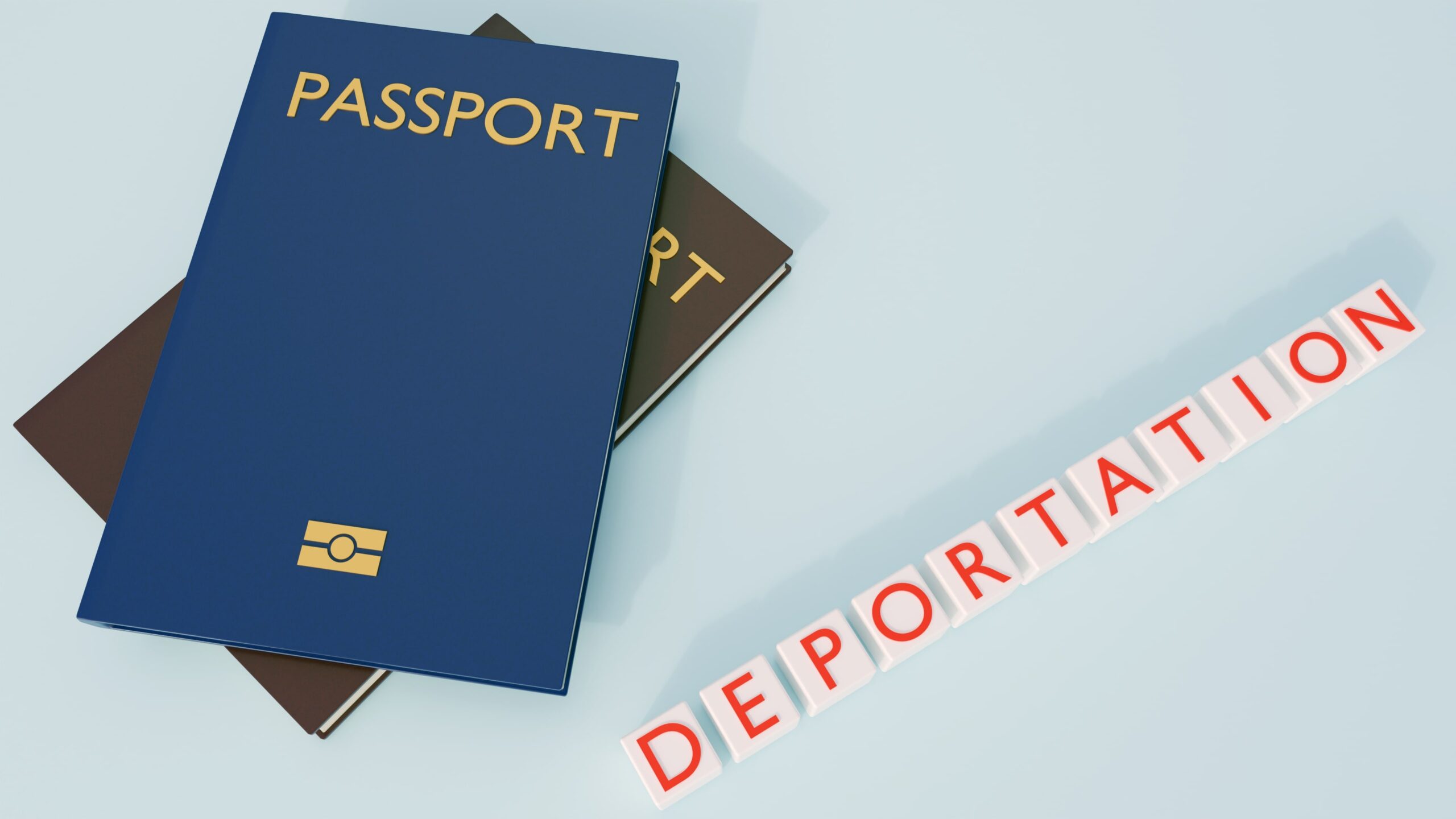 Паспорти та слово Deportation на світлому тлі